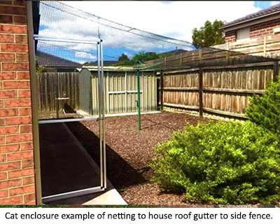 confine-your-pet-cat-enclosure-example-of-netting-from-house-to-fence.png