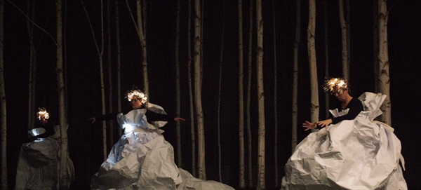 People performing a dance on stage